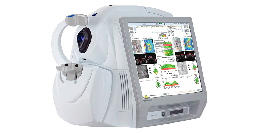 Photo of a machine with a camera on the front and large screen on the side that is used to scan a patients eye as part of a health screening.
