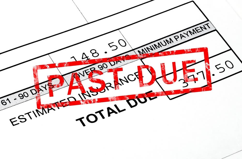 Close-up of a 'Past Due' notice on a bill
