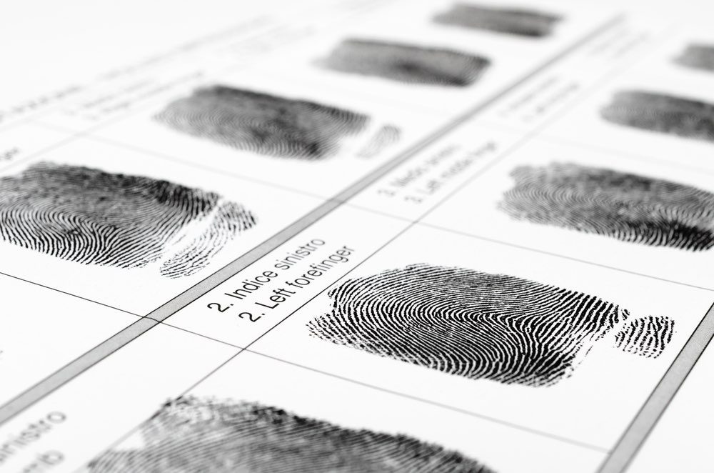 Close-up of fingerprint card with labeled black ink prints