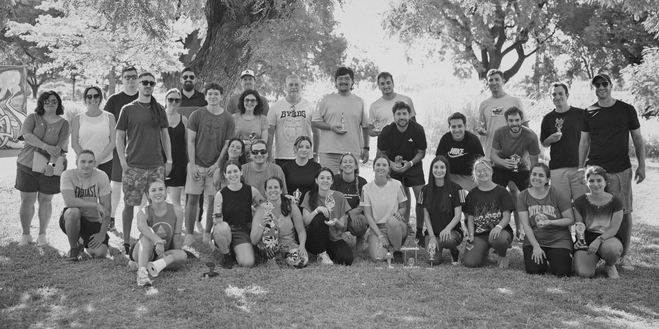 The Ryz Labs team gathered in a courtyard after an evening event
