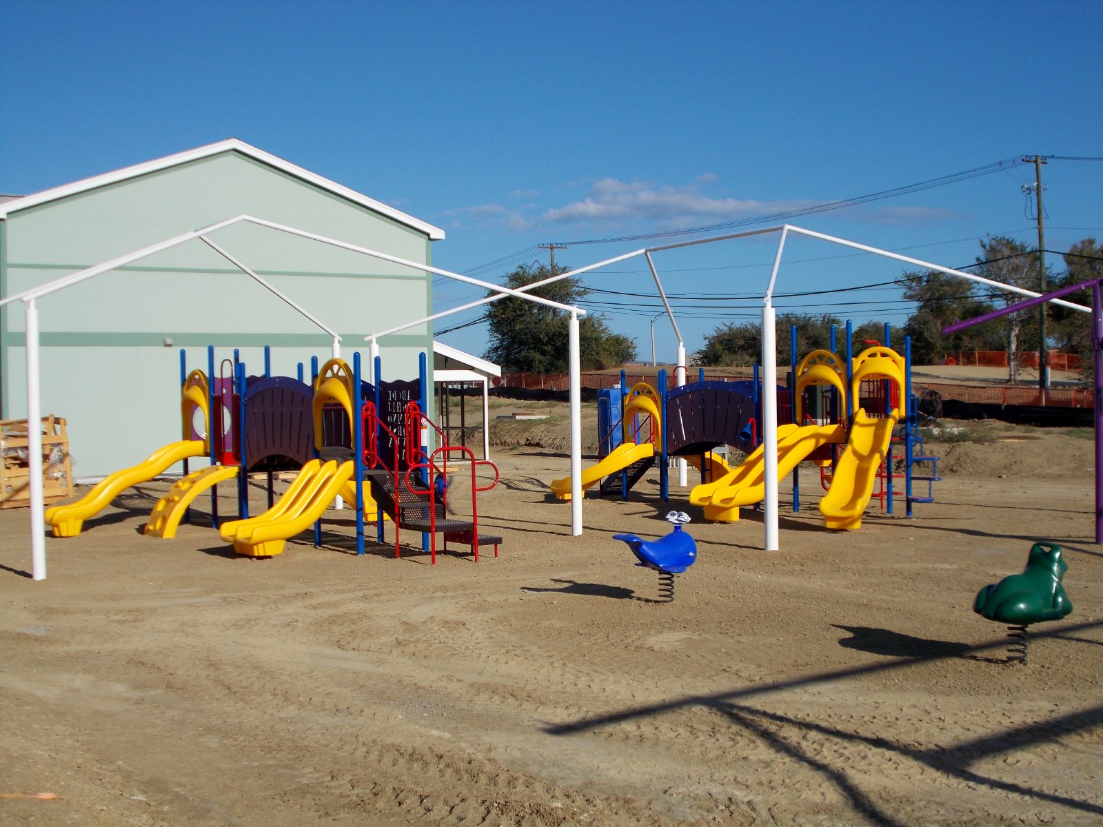 Completed playground structures under new shade canopies at Guantanamo Bay