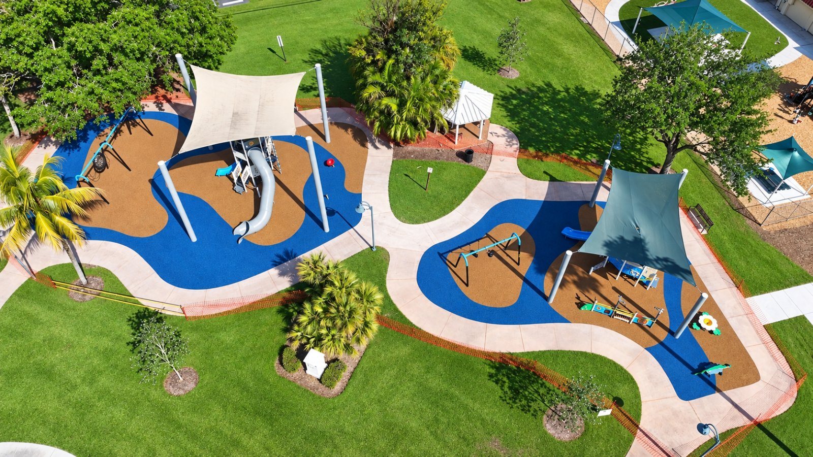 Shade sails over a completed IGS playground installation