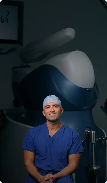 Mr Bilal Barkatali in a knee surgery consultation room