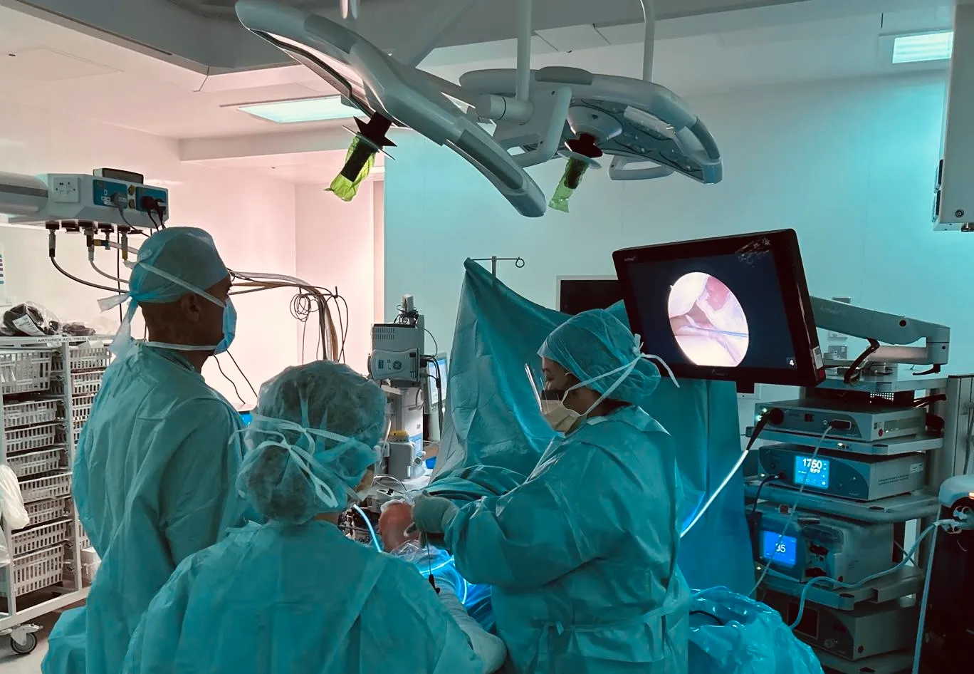 Consultant reviewing a knee X-ray with a patient