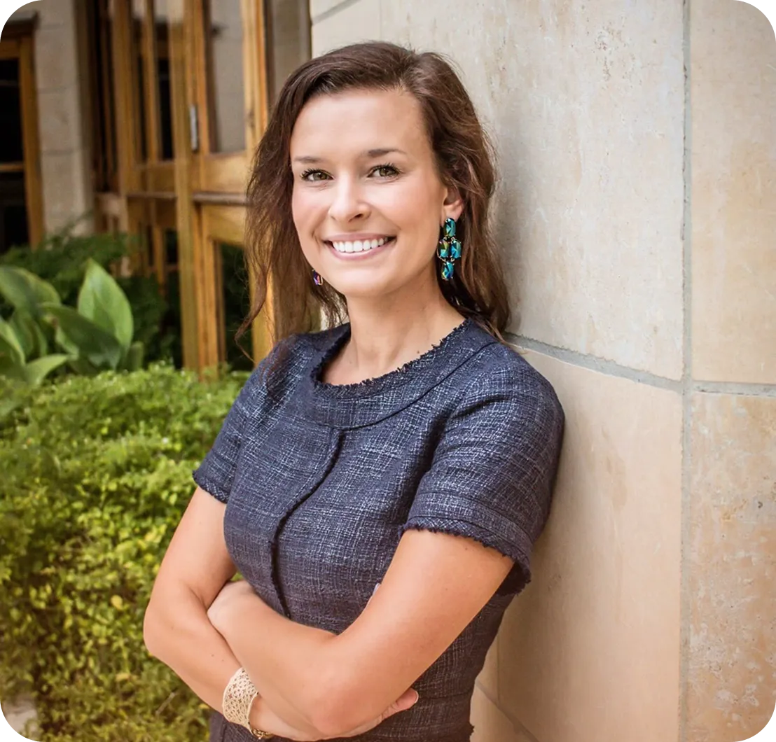 Dr. Kristin Saunders smiling outdoors.