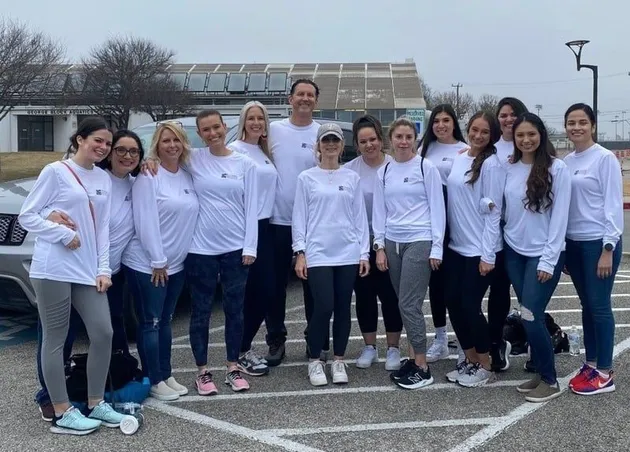 Pierson & Saunders Orthodontics team volunteering at a San Antonio food bank distribution