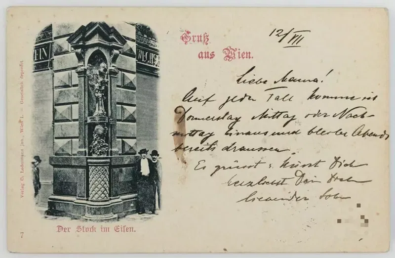 Ansichtskarte 1898 mit dem Aufdruck Gruß aus Wien: links der Stock im Eisen in einer Nische an einer Hausecke, daneben zwei Männer, rechts eine handschriftliche Nachricht