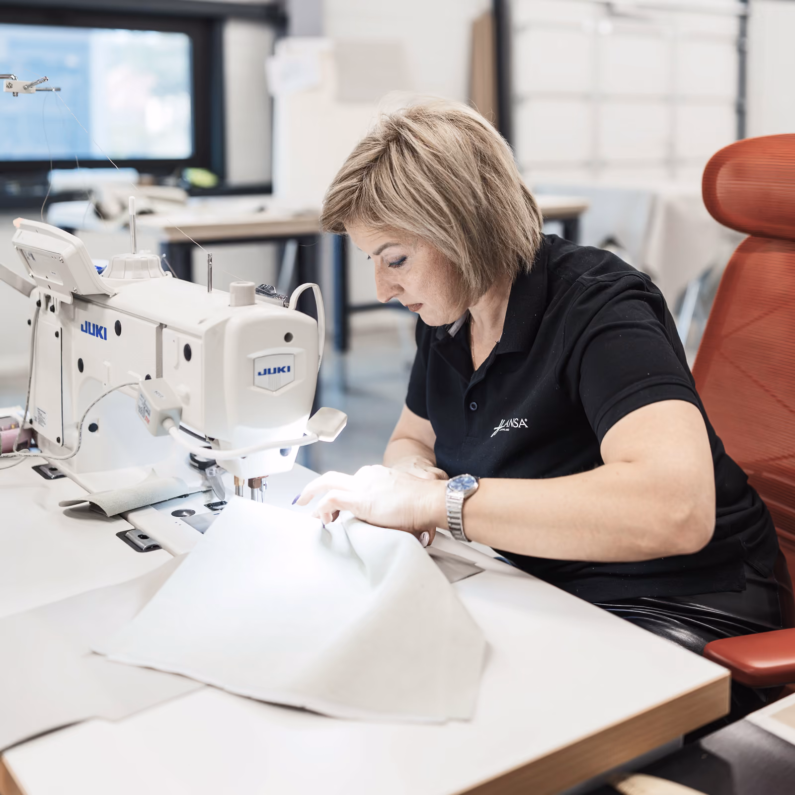 Photo of Hansa Executive MRO interior workshop worker doing business jet interior refurbishment.