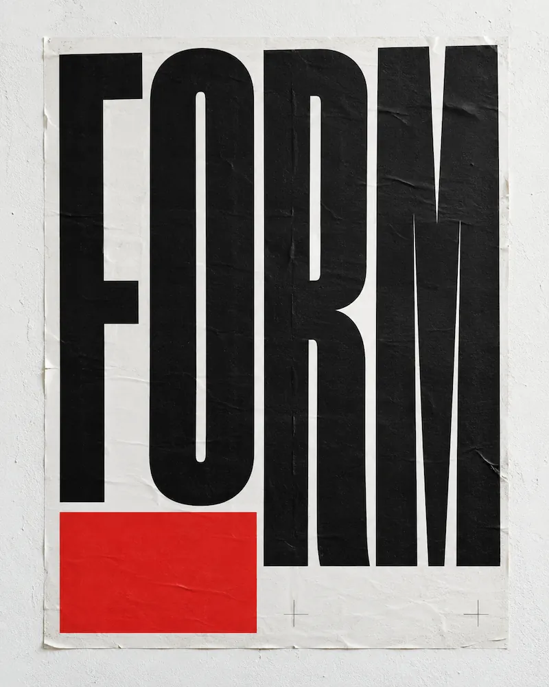 White poster on a wall with the word FORM in large black uppercase letters and a solid red square below the letter F.