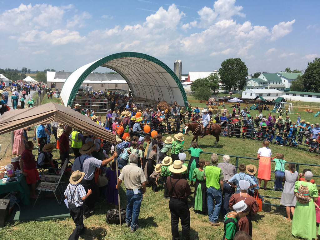Thundura fabric structure used for animal shelter at a fair.