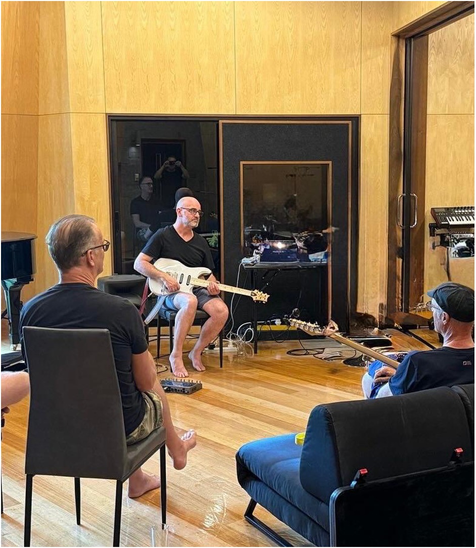 Rob Harris teaching a small group in the studio at Karma Studios