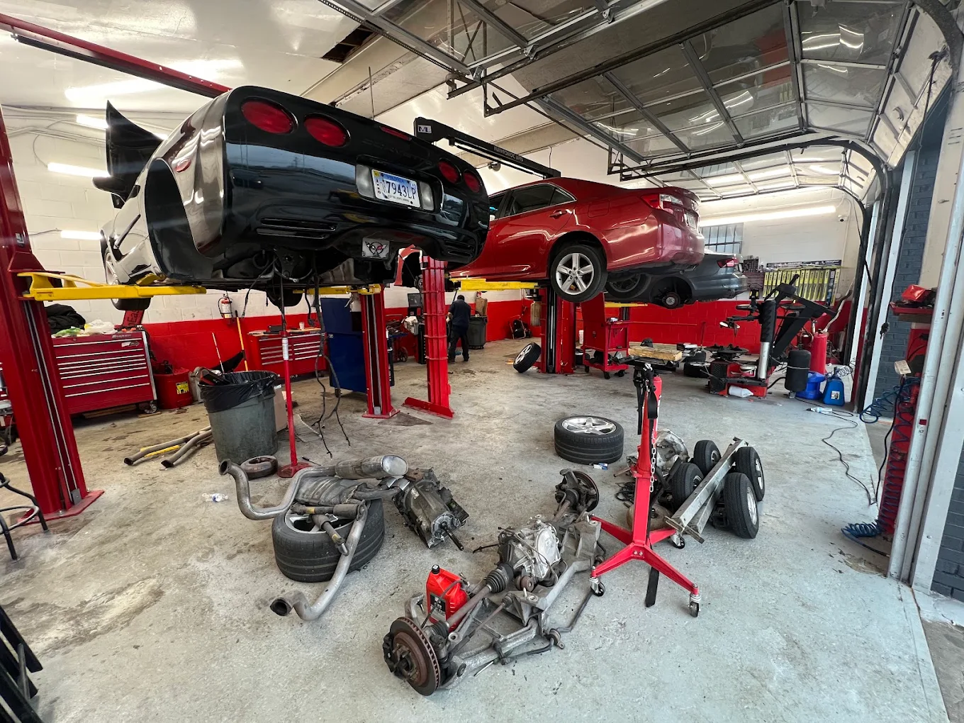 Vehicles on lifts inside the Nutley Street Service Center garage