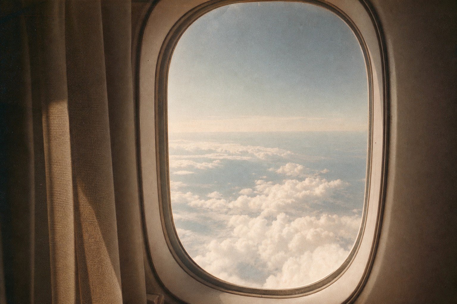 Clouds seen through an airplane window