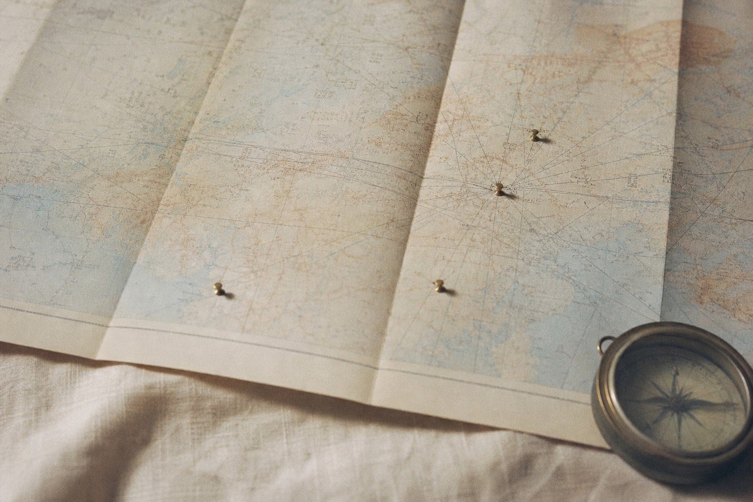 Aeronautical chart with a brass compass
