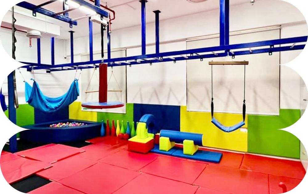 Bloom Beyond sensory gym with swings and soft play equipment