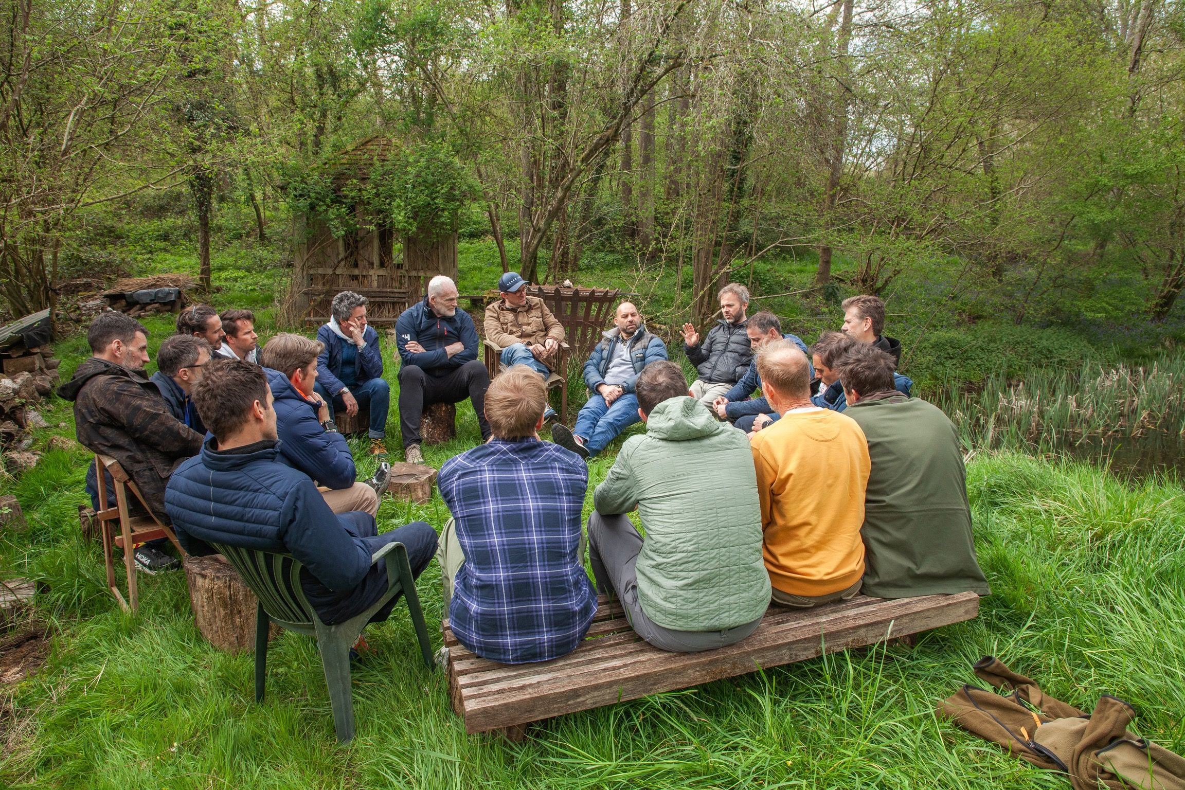 Monumental members in a close circle at a UK retreat