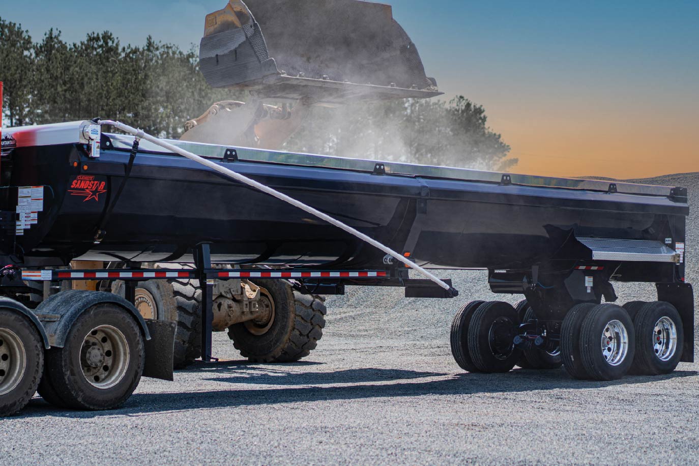 Dark blue SandStar end dump trailer