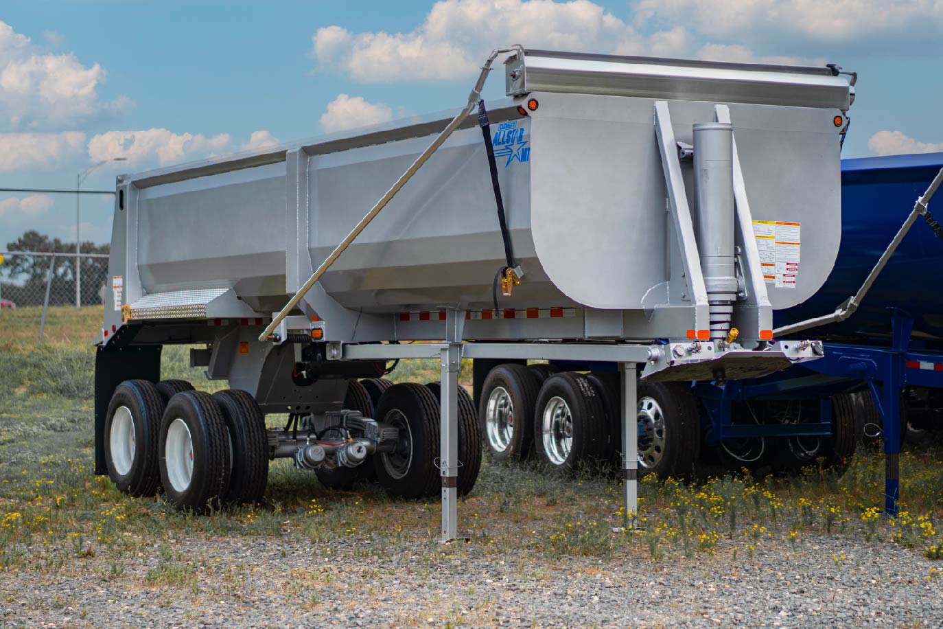 Grey AllStar MT end dump trailer