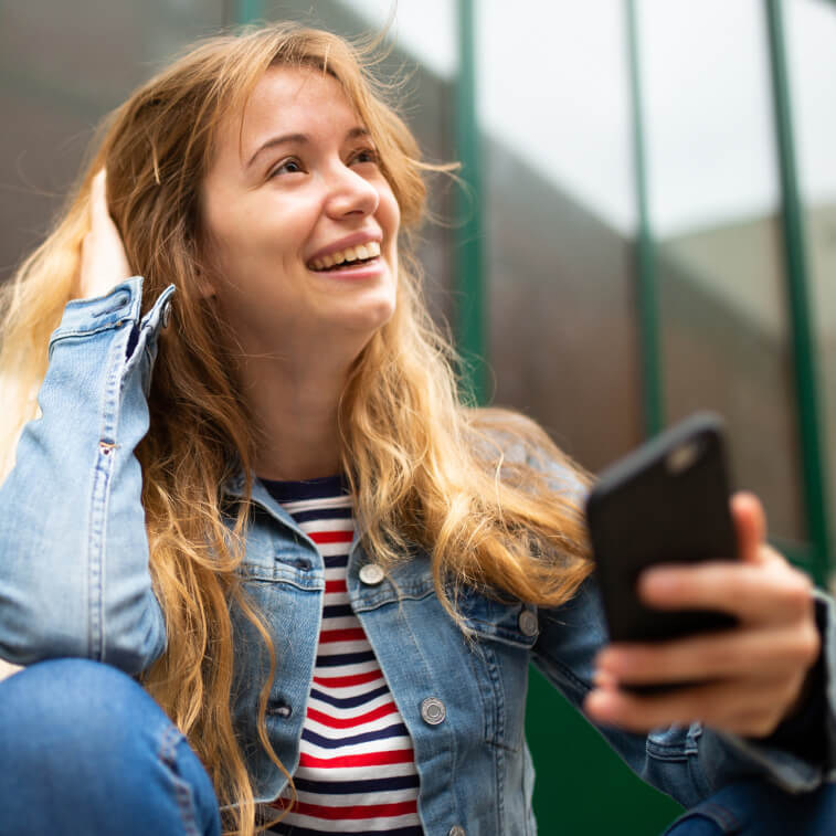 woman holding phone