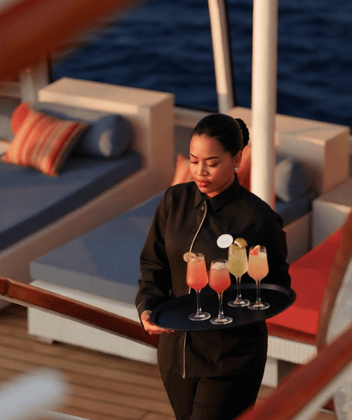 woman crew delivering drinks