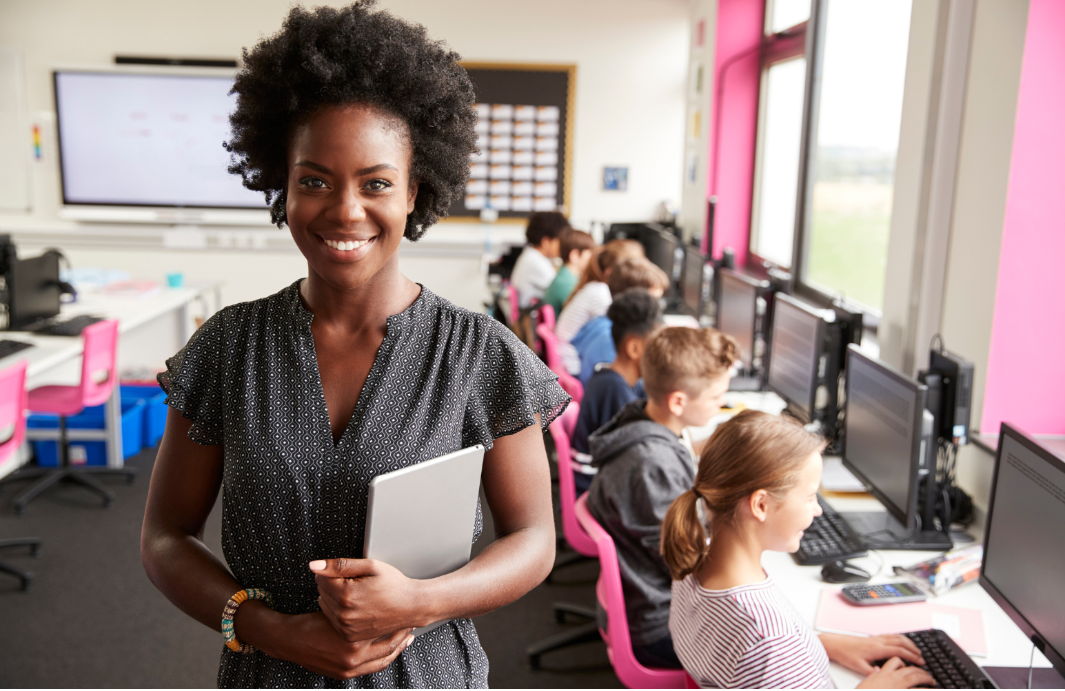 image of a digital literacy class in a modern setting