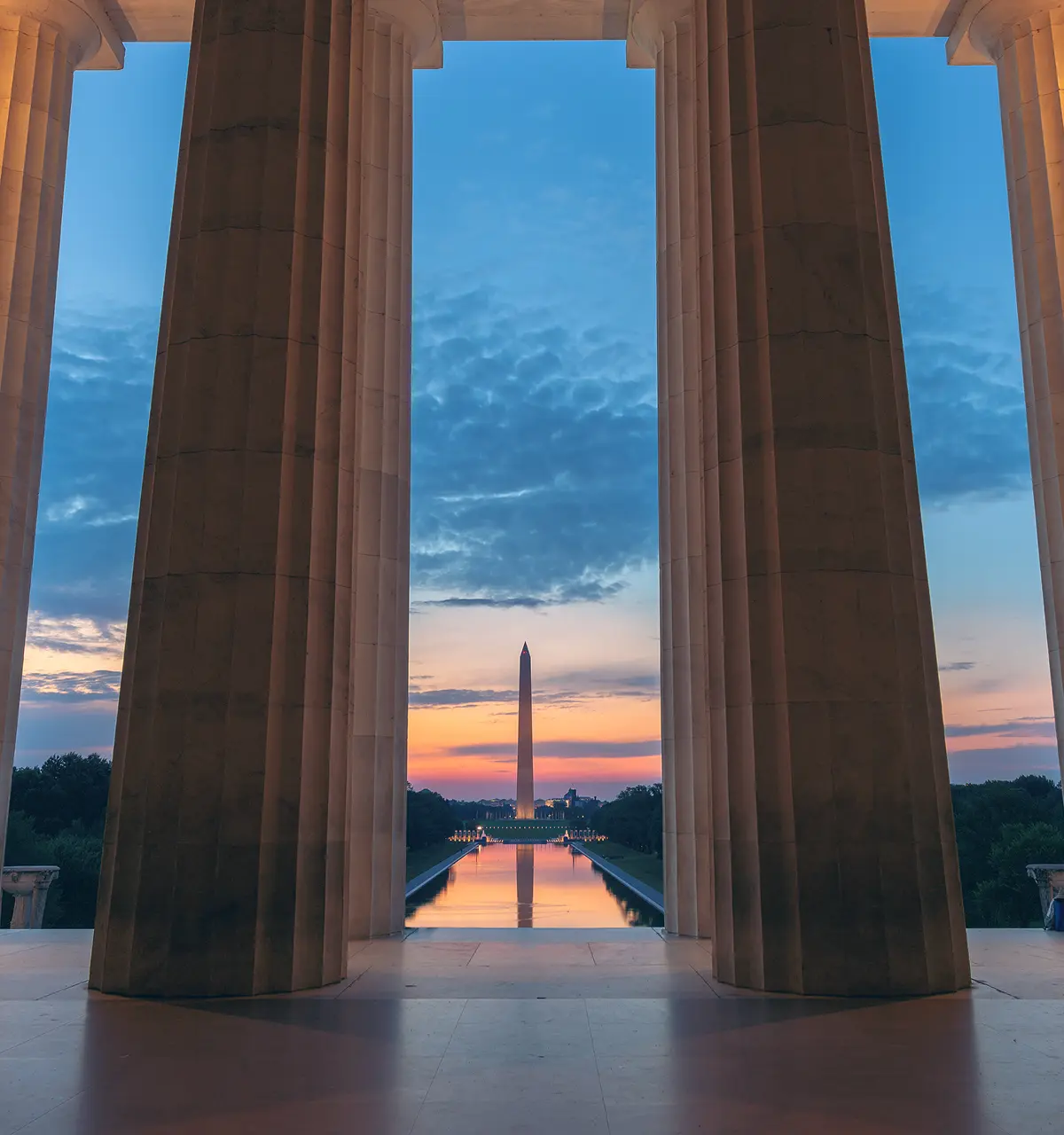 Building pillars overlooking sunset