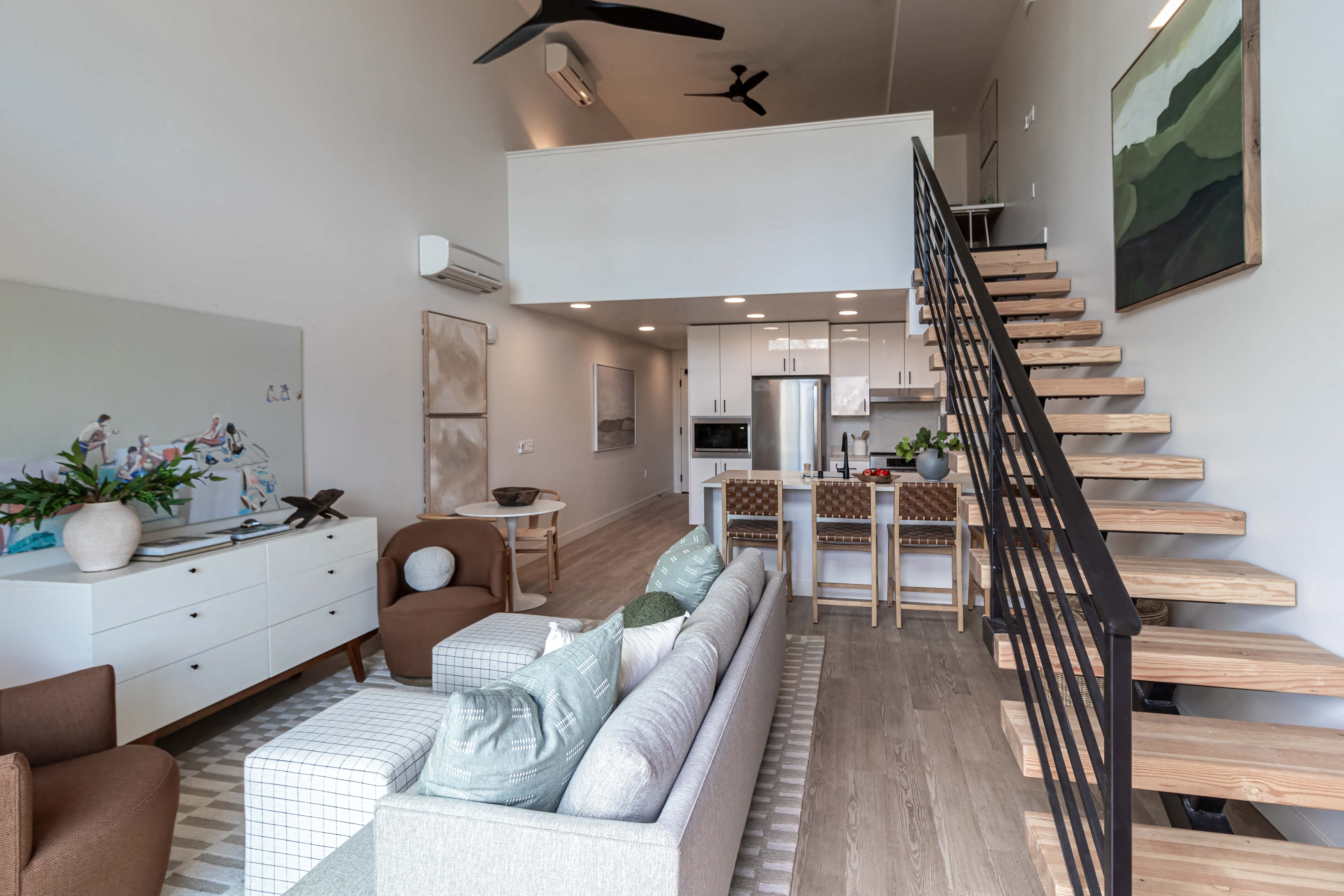 Living room to kitchen area and stairs