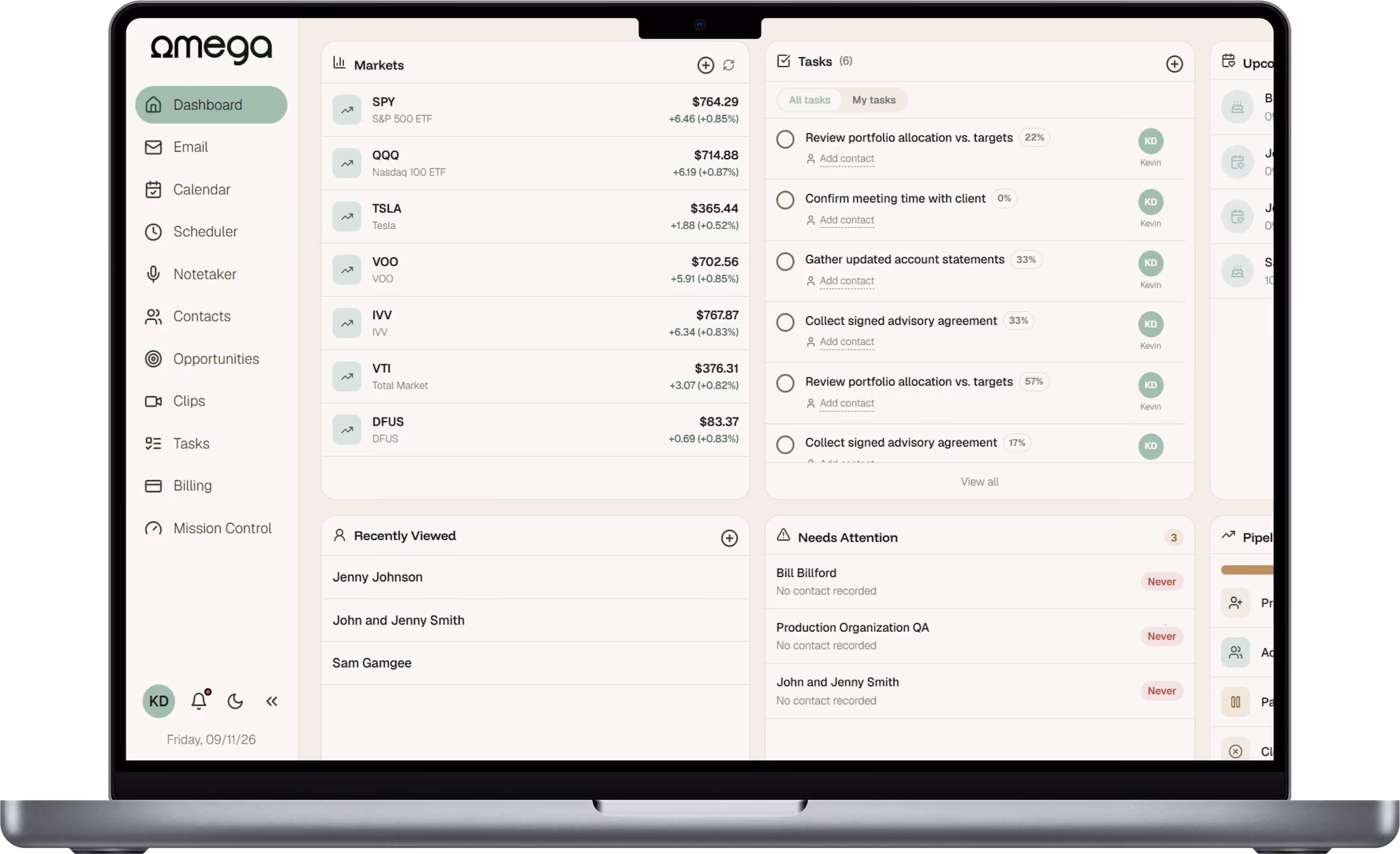 OmegaFP CRM dashboard shown on a MacBook