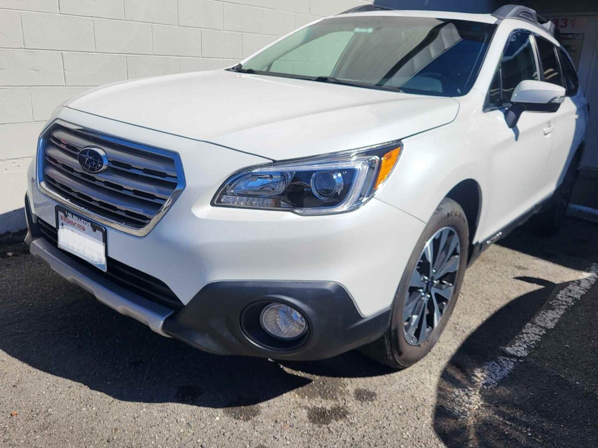 The same Outback after repair, a new bumper cover fitted and the corner and fog lamp opening back in line