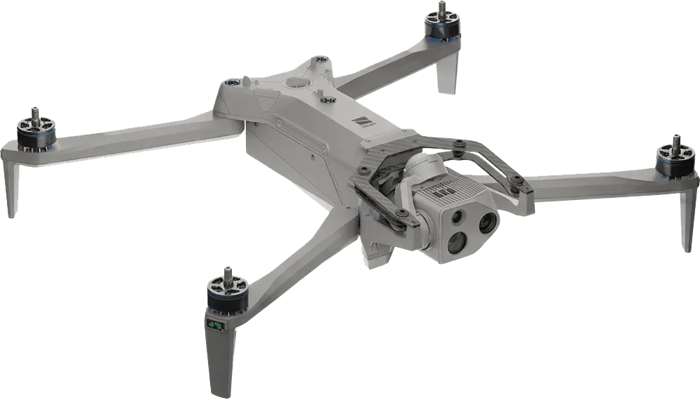 Gray quadcopter drone with a front camera and extended arms for propellers.