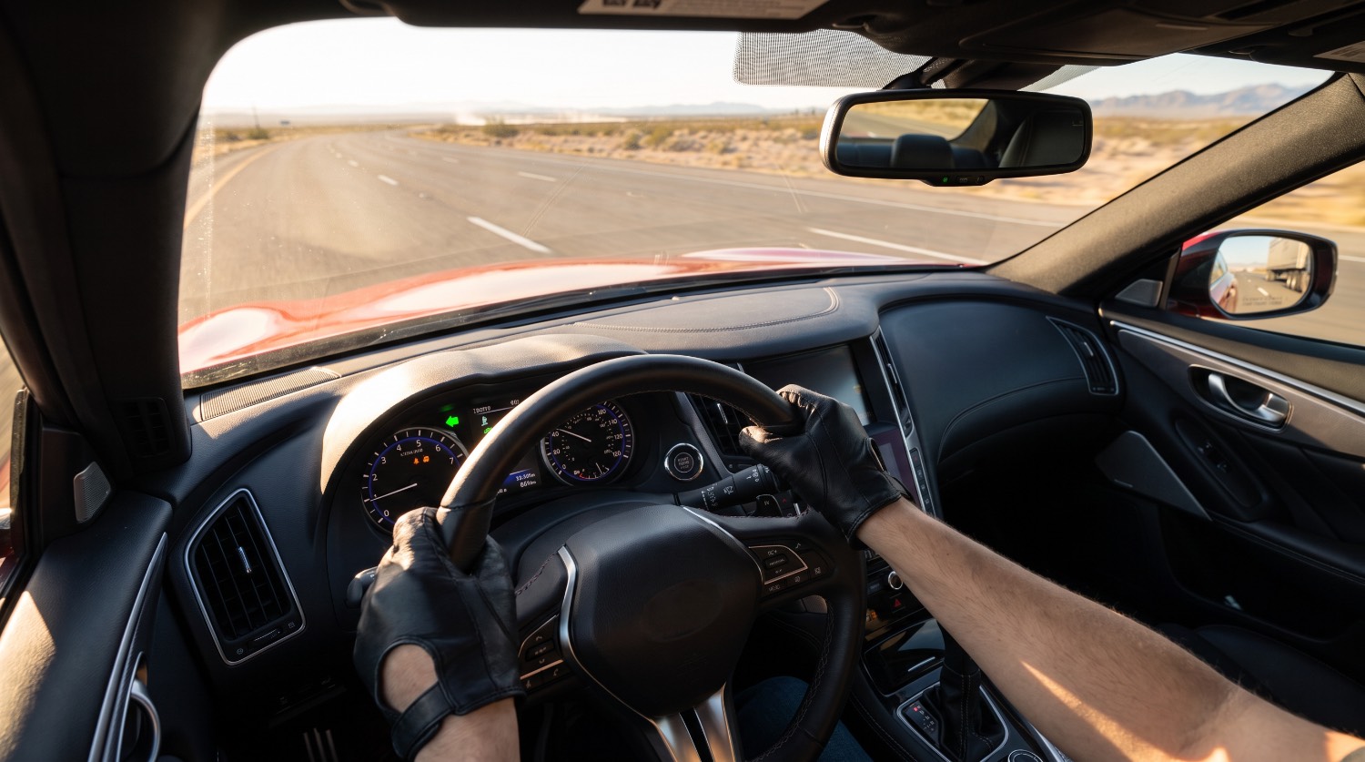Driver point-of-view still on a coastal highway