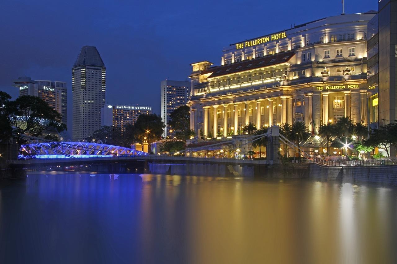 A large building with lights on itDescription automatically generated