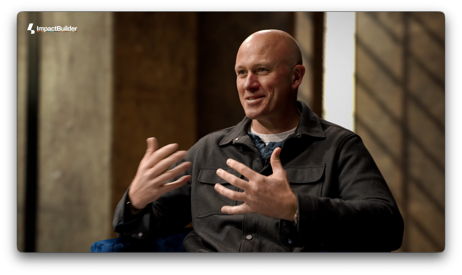 A man speaks to a camera as part of an interview