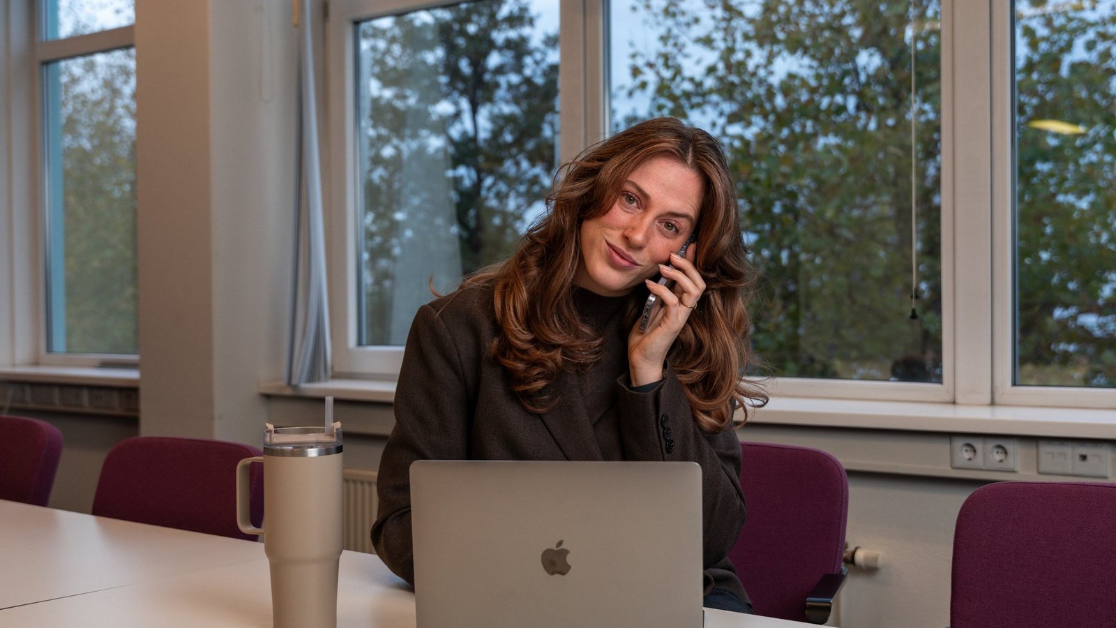 Aniek from Pro Contact working in the office