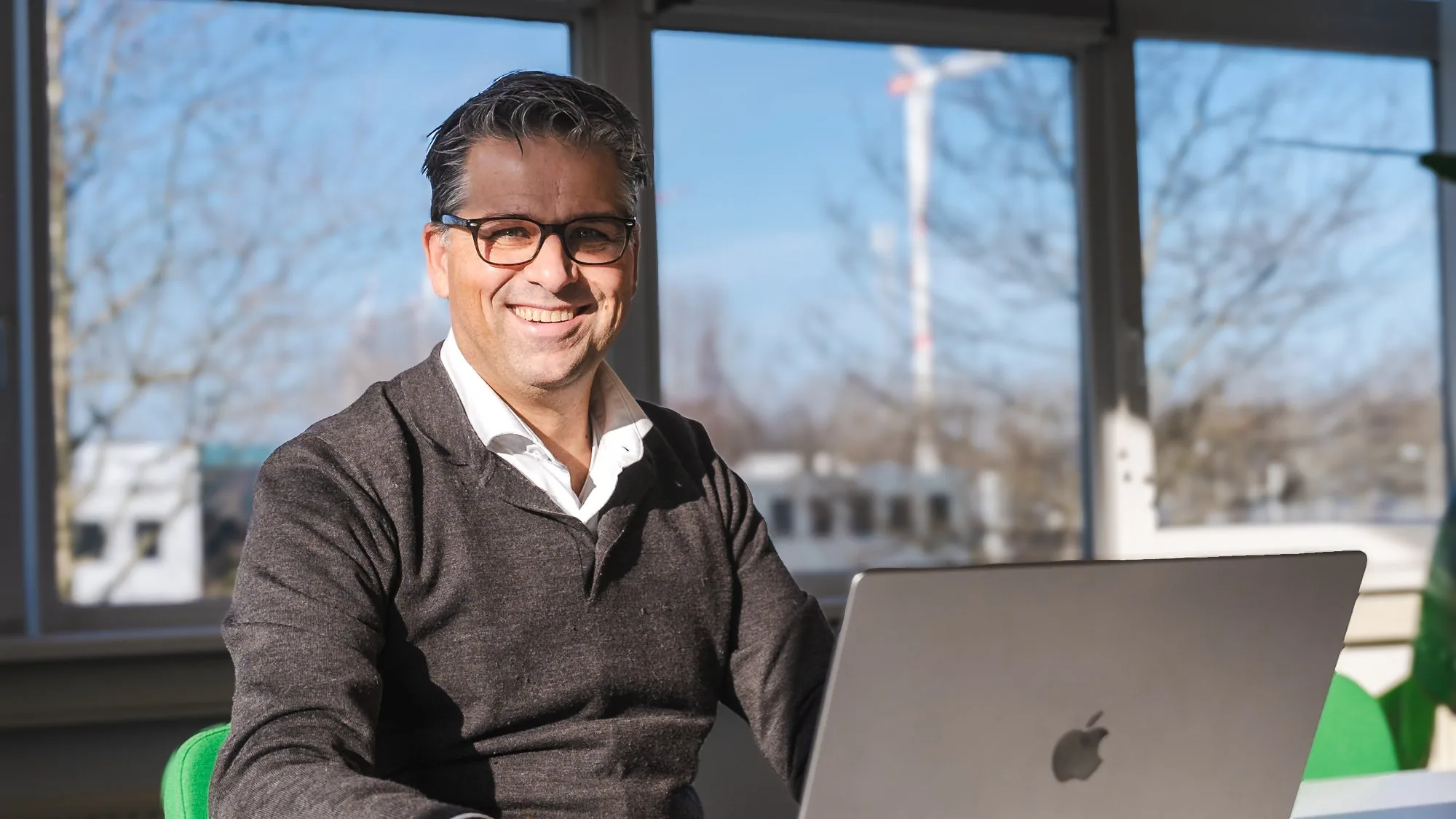 Remco Kraal, Operations Director at Pro Contact, at his laptop