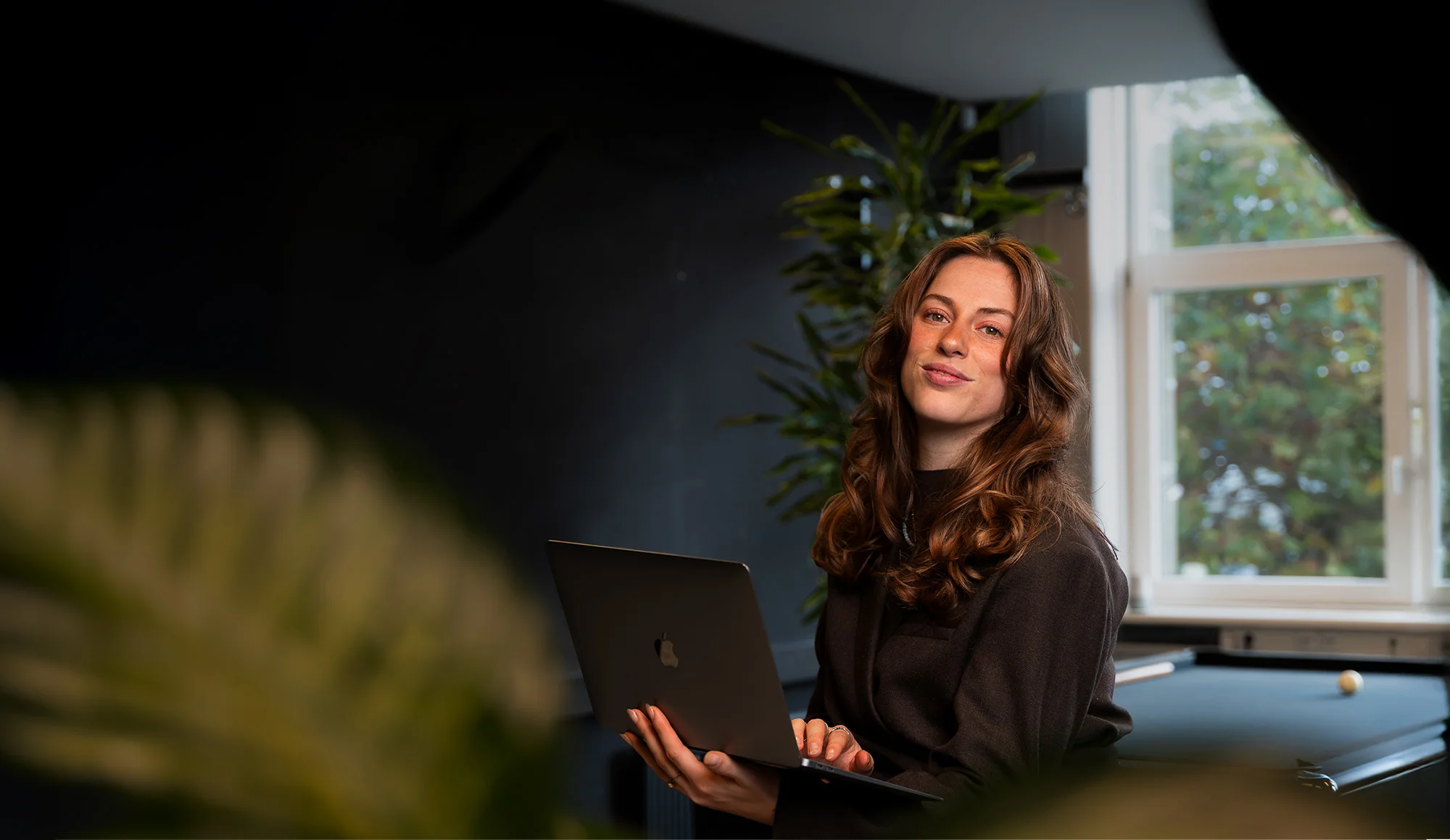 Aniek from Pro Contact at work in the office