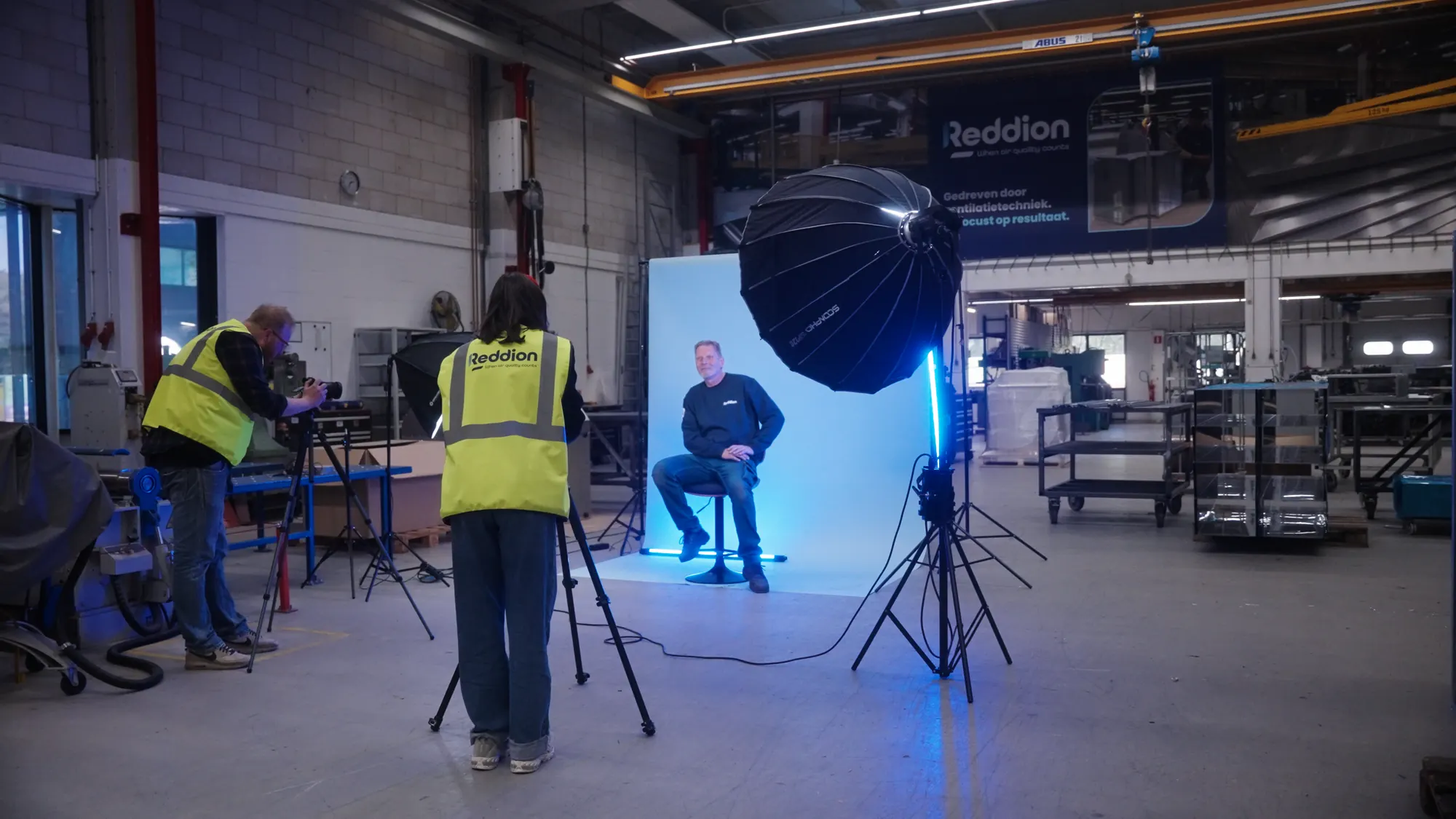 Pro Contact filming and photographing an employee on the shop floor at Reddion