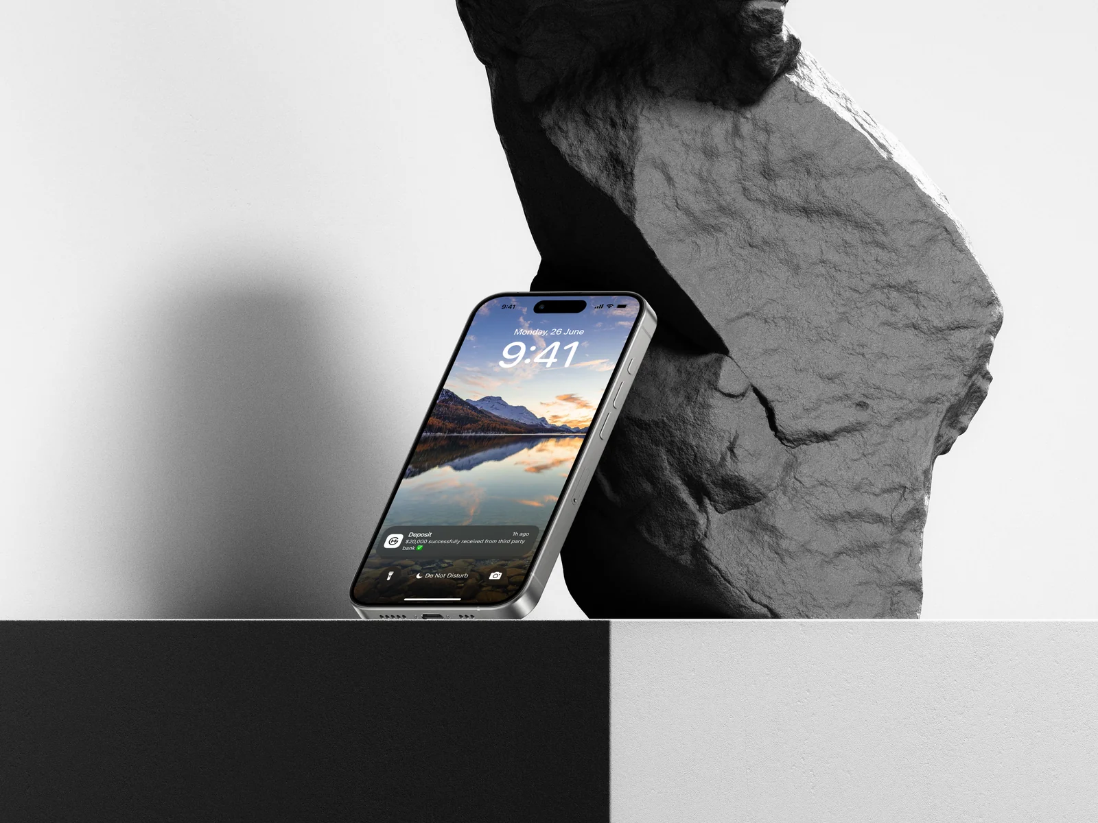 iPhone app presented in a stone mockup scene