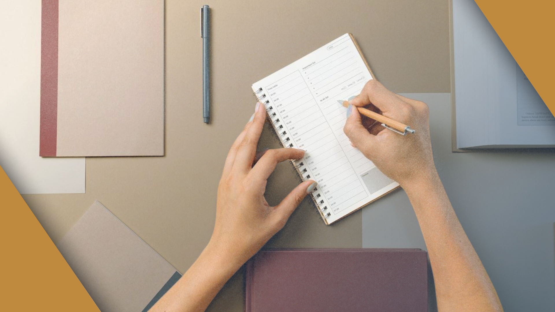 Hands writing in a daily planner surrounded by notebooks.