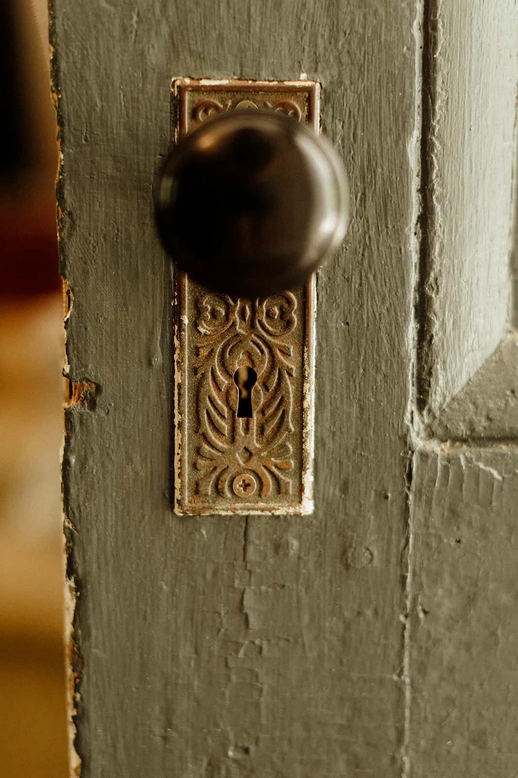 Antique keyhole detail at Coach Stop Inn in Bar Harbor, Maine