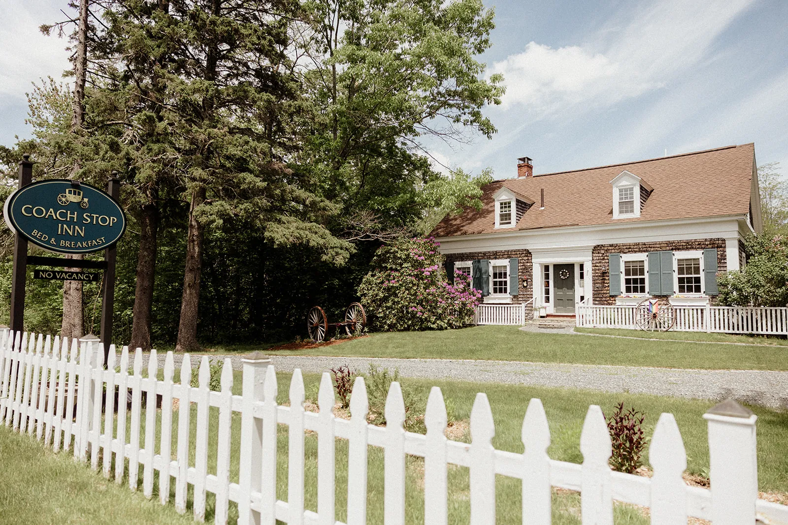 Coach Stop Inn behind its white picket fence in Bar Harbor, Maine