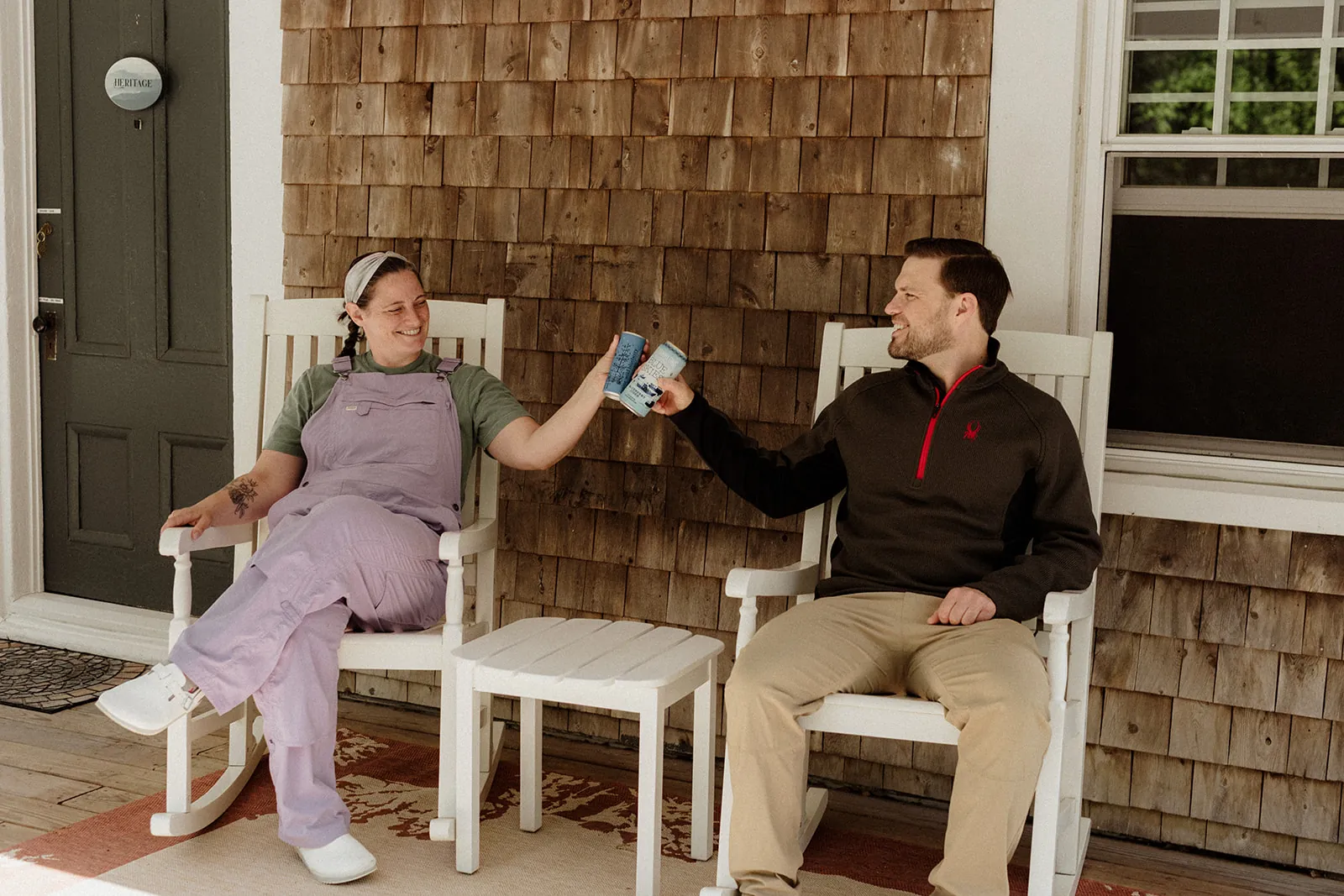 Amanda and Derrick on the covered porch at Coach Stop Inn