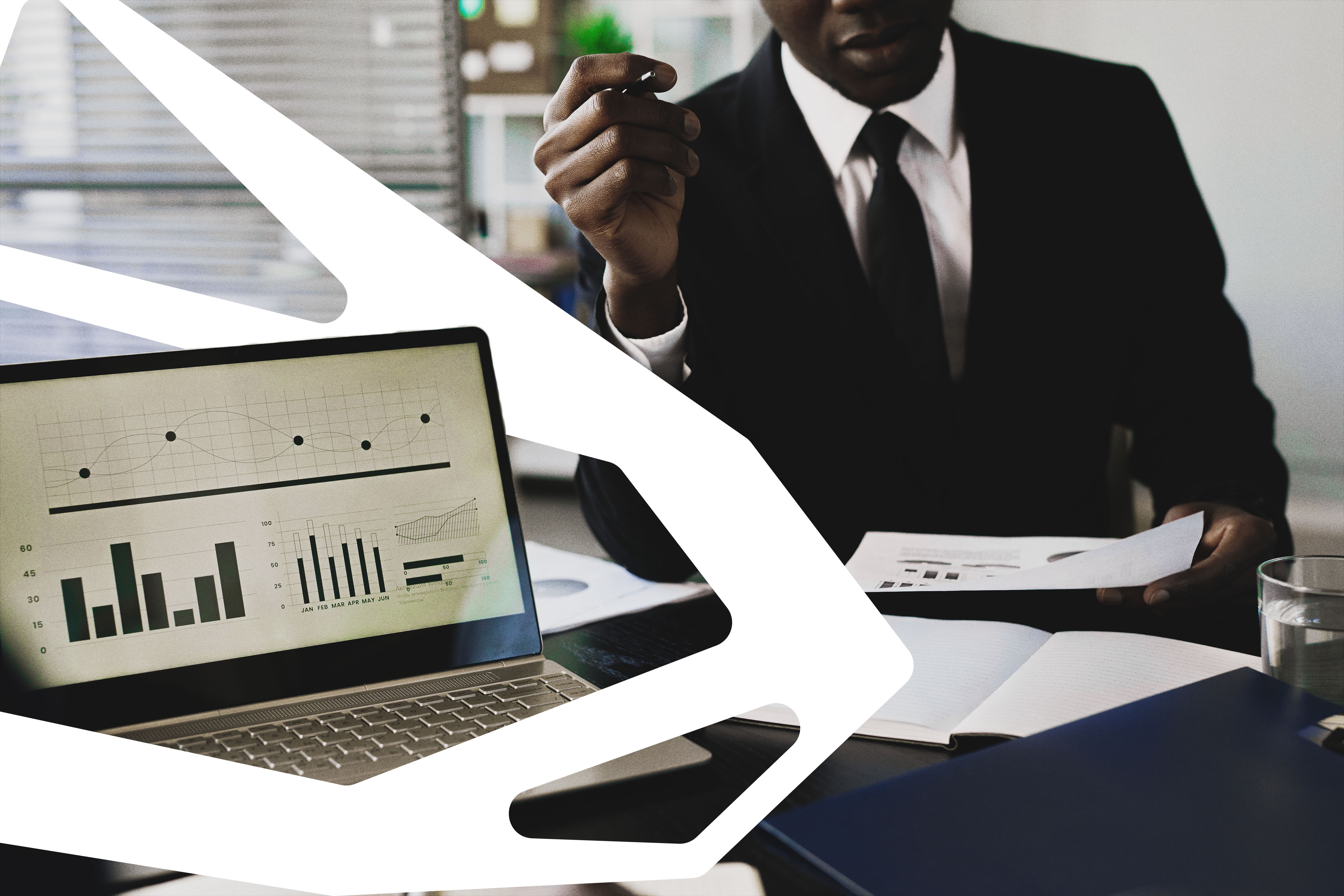Advisors comparing household reports on a laptop