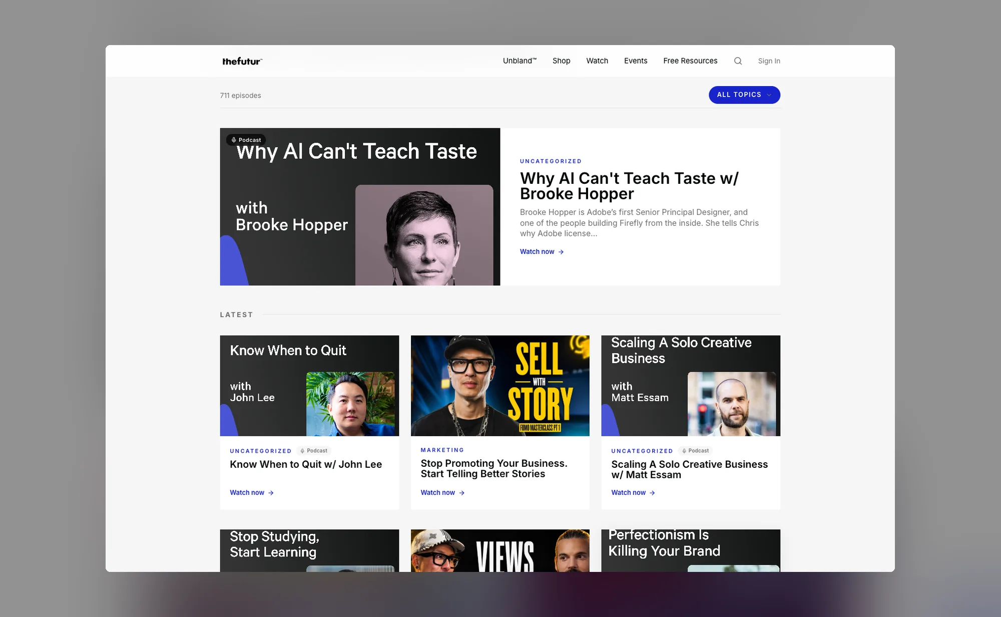 The Futur's video library, showing a count of 711 episodes beside an All Topics filter, a featured episode and a grid of episode cards tagged by category