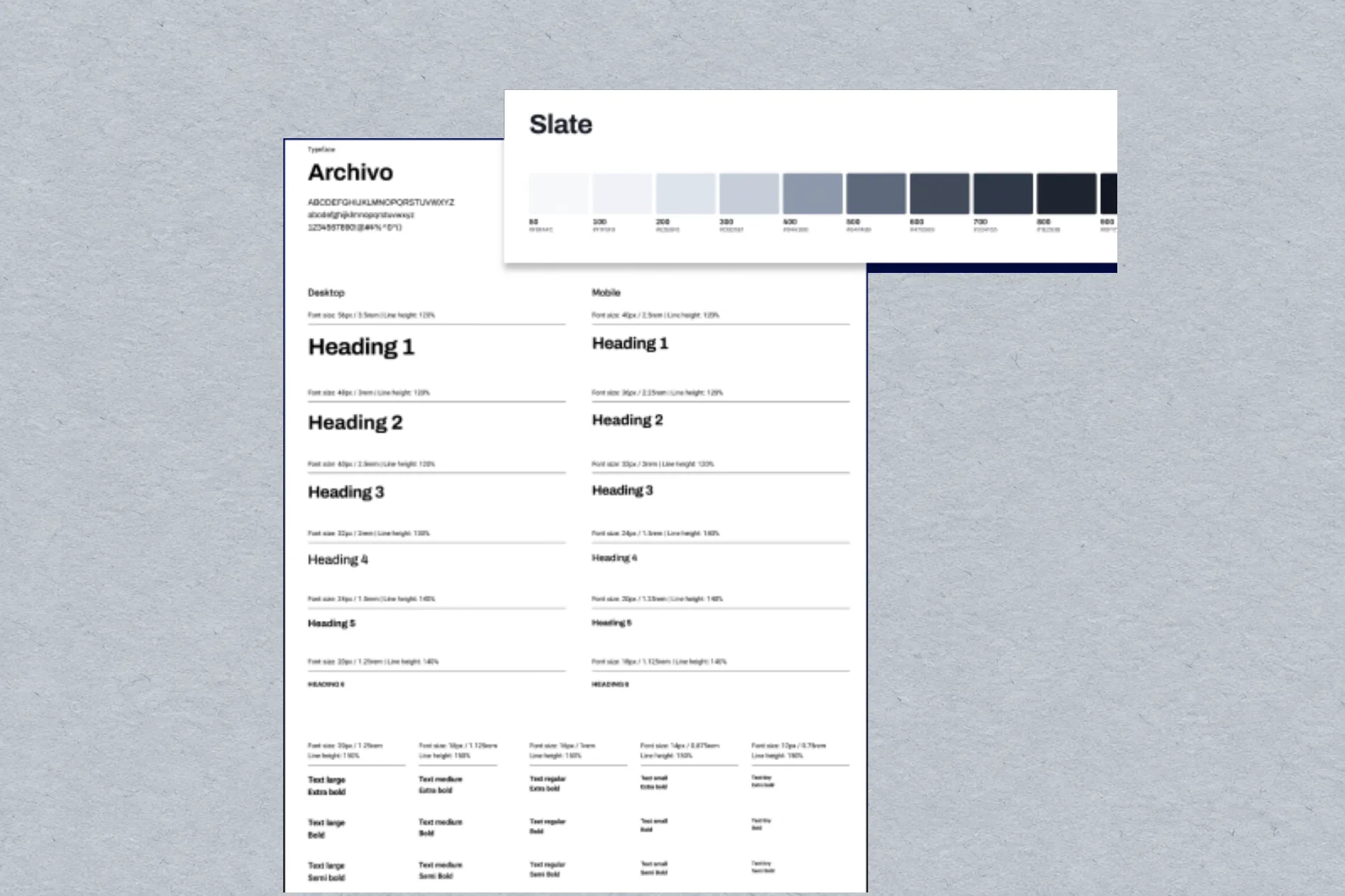 Slate design system sheets with a grey color scale and heading type specimens, on cool slate paper