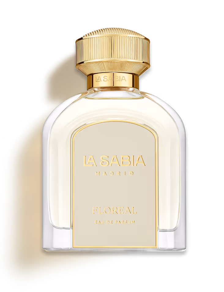 Clear glass perfume bottle with gold cap labeled La Sabia Madrid Floreal Eau de Parfum.