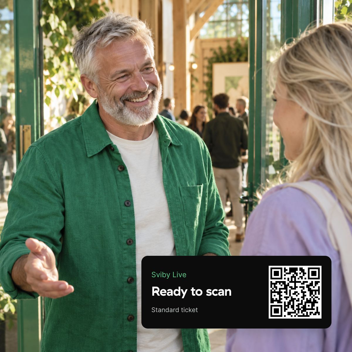 A welcoming event host with a clear ready-to-scan sample ticket