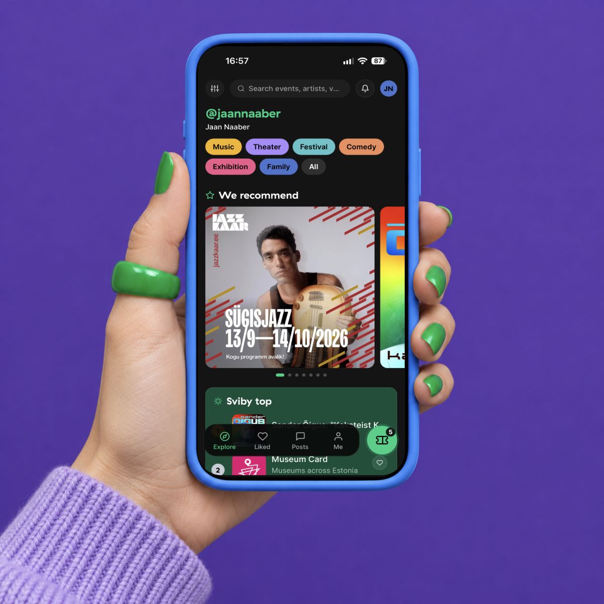 A hand holding a blue phone with the original Sviby Explore screenshot