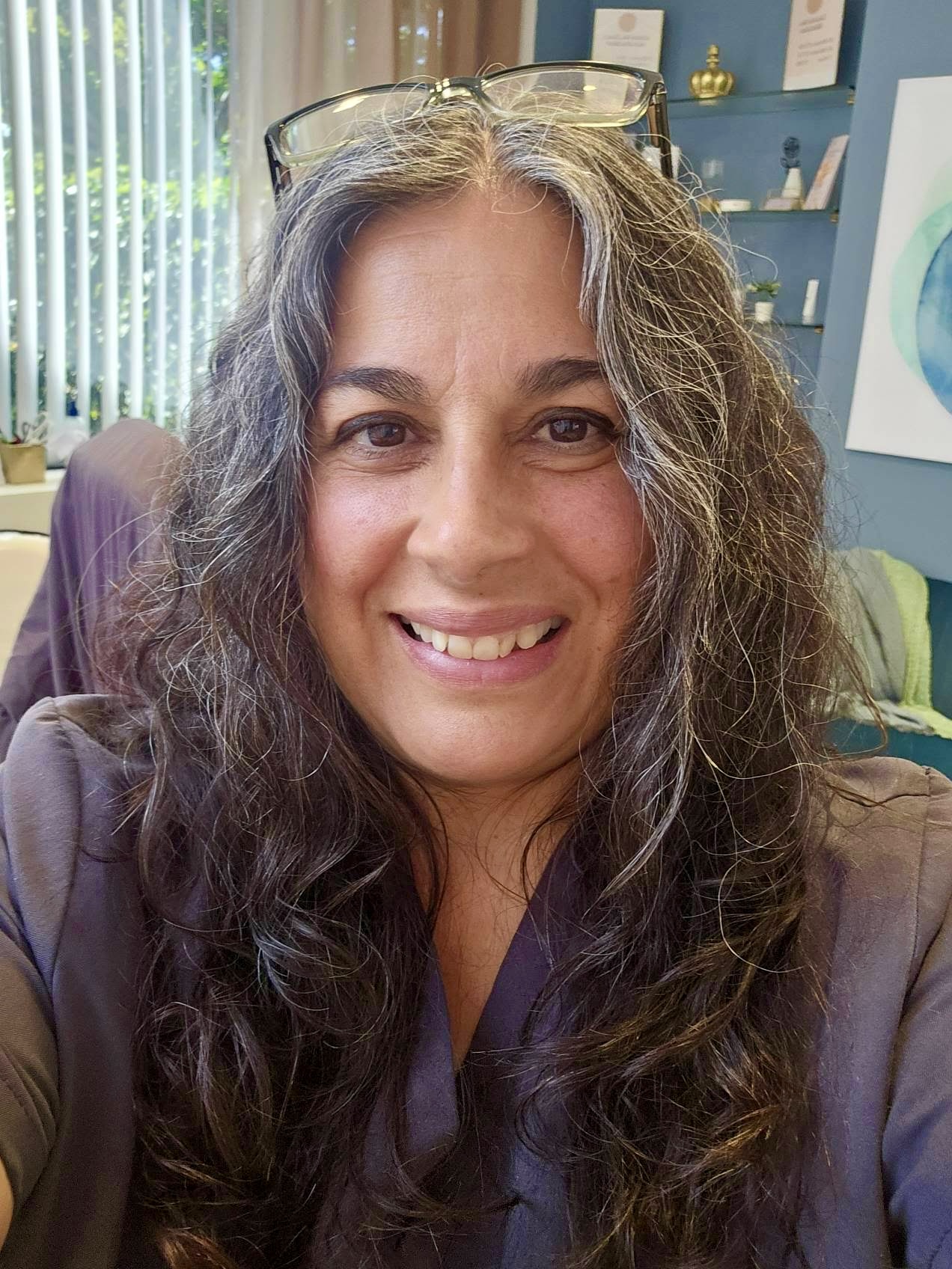 Confident, smooth skin after electrolysis treatment at Alara Electrology San Diego