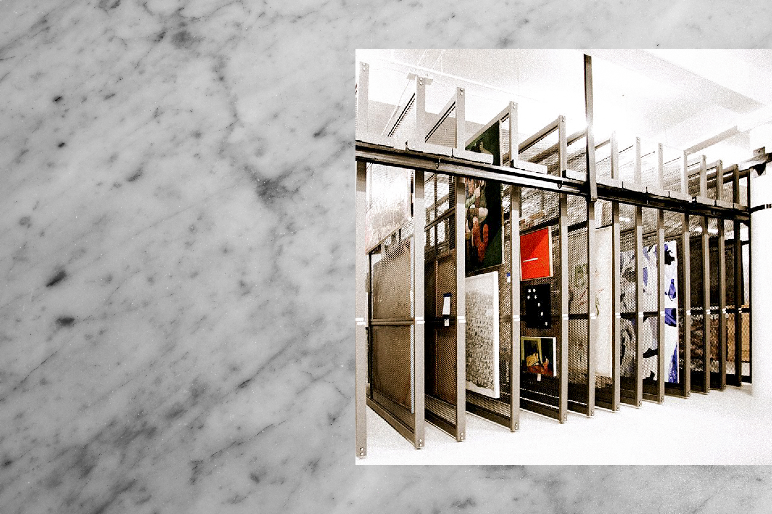 Framed works on sliding racks in art storage